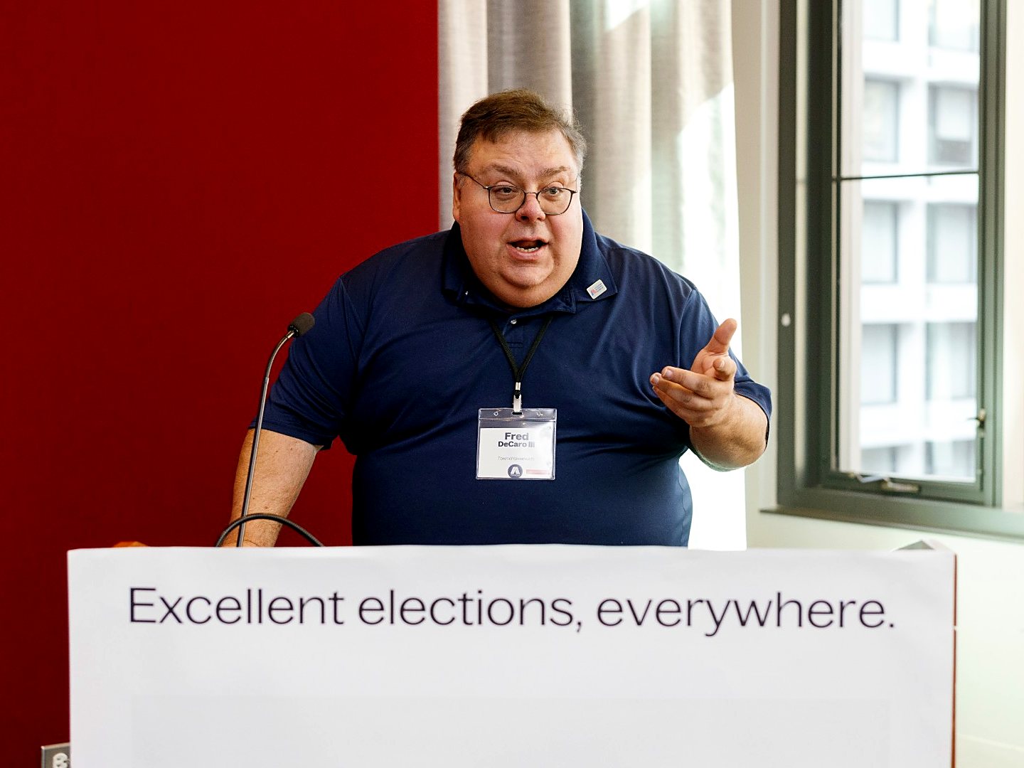 Fred DeCaro III speaking at a Greenwich election event